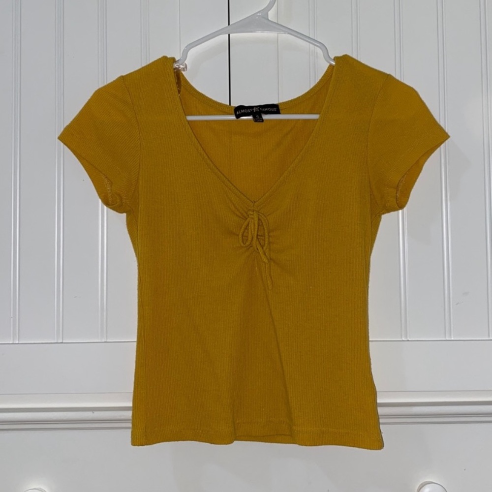 •Almost Famous Yellow Shirt W/ Bow In The Middle